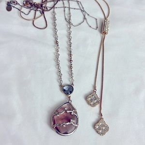 Two gold tone long necklaces